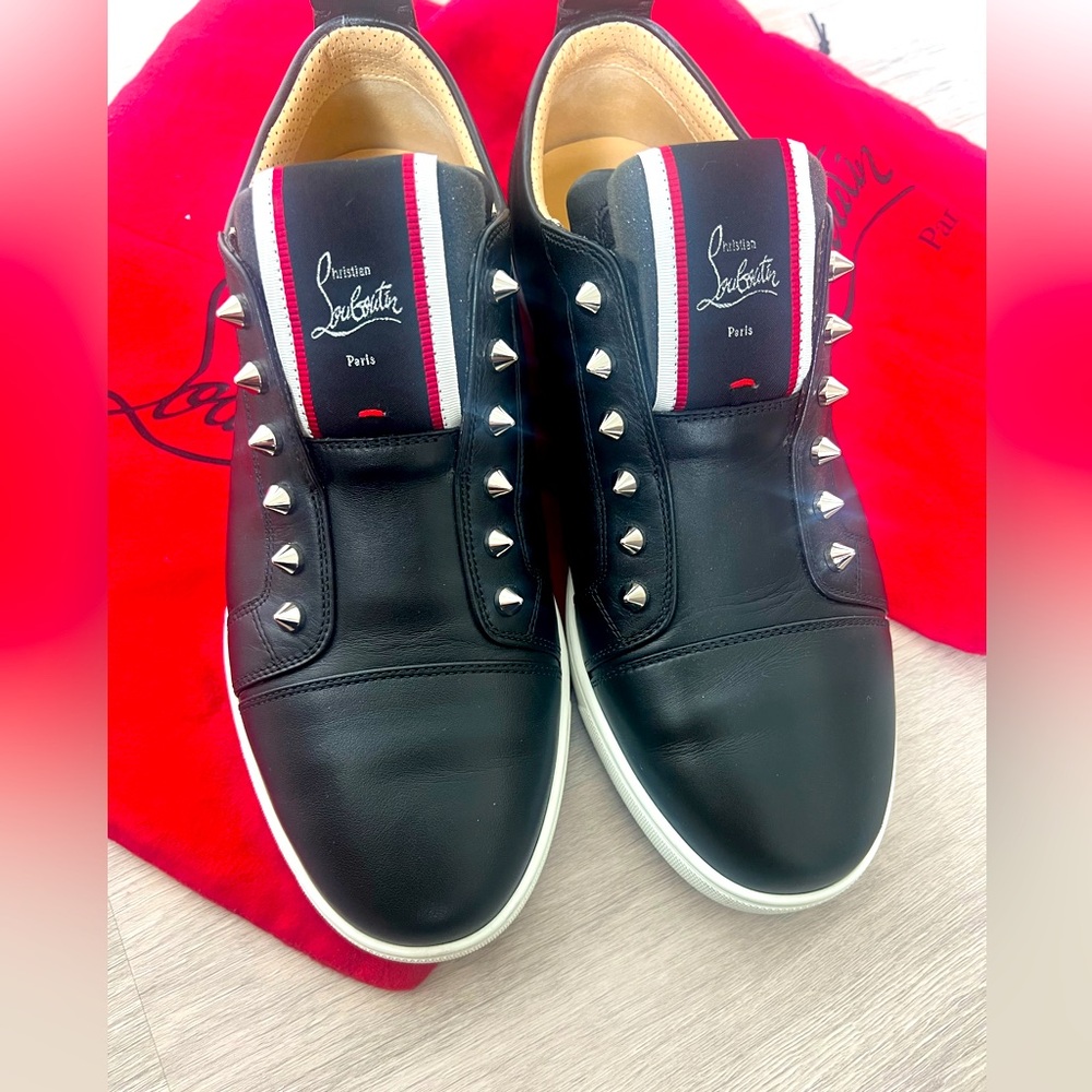 Mens Louboutin slide on sneakers. Great condition, extra spikes and bag included